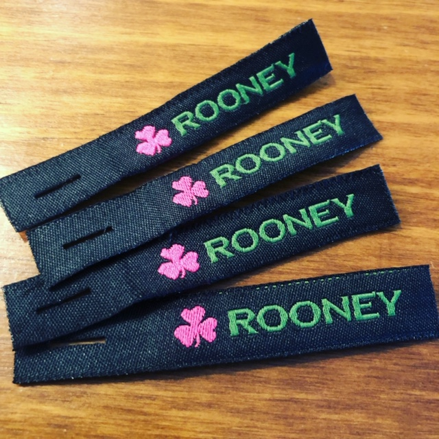 a custom woven zipper pull by Custom Couture Label Co