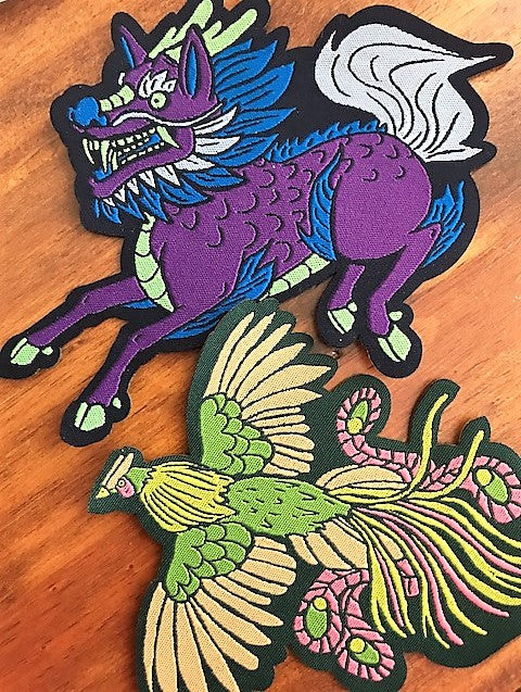 Die cut edges on woven iron on patches