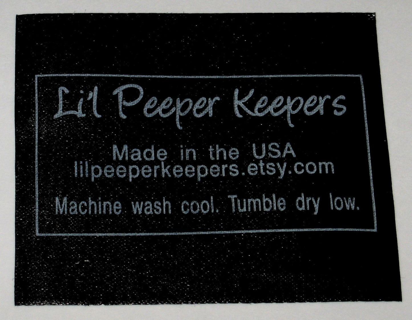 Black Satin Screen Printed Labels with Silver Imprint