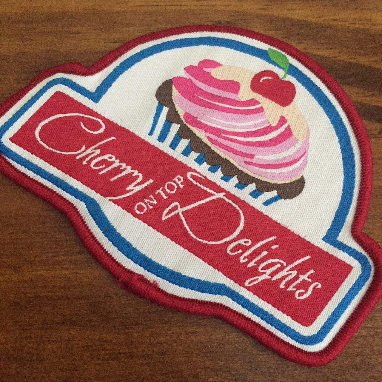 A woven iron on patch